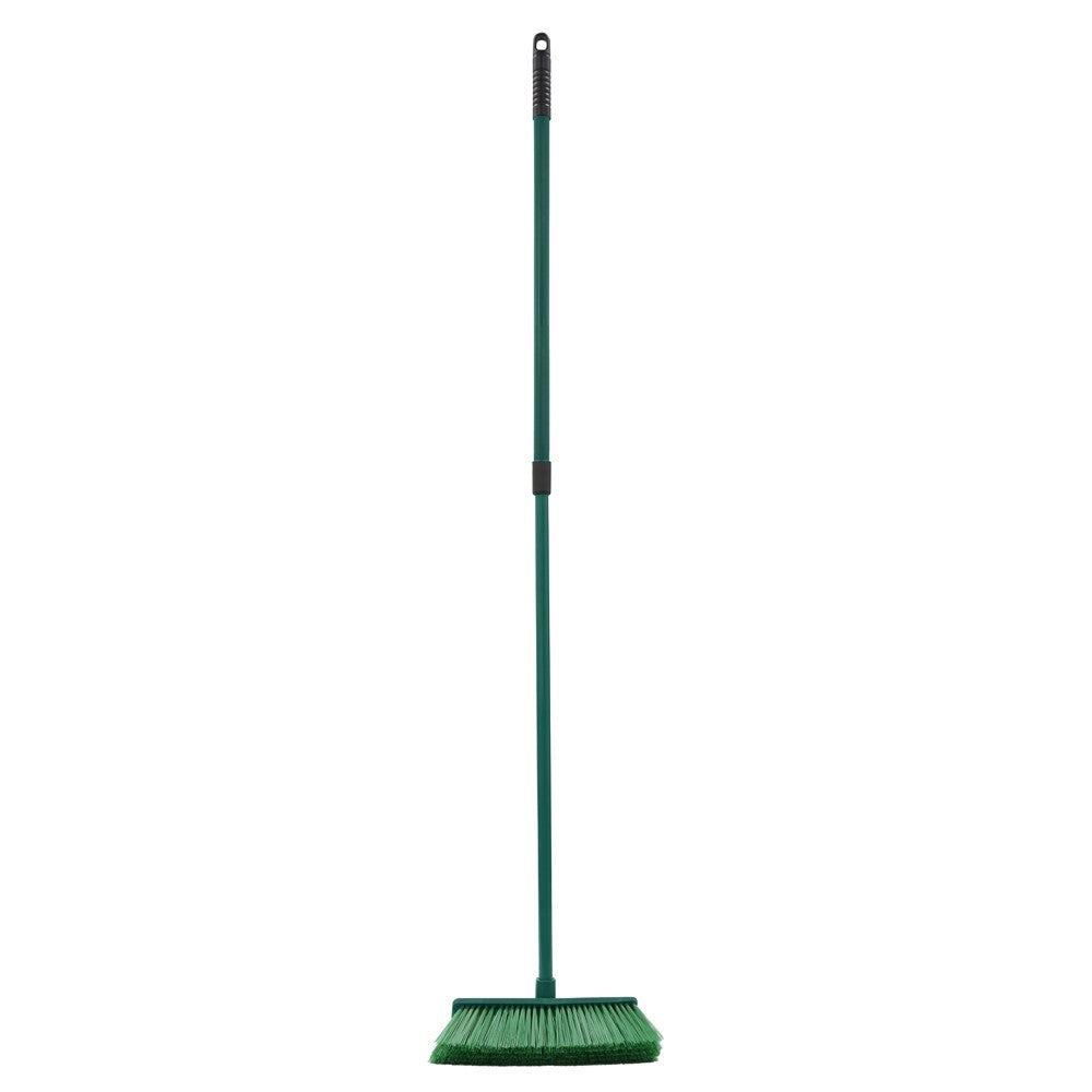 The Gardener hard bristle broom with green telescopic handle and dense green bristles on white background.