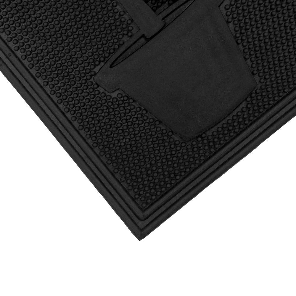 Close-up of black Latex Coir Home Sweet Home scraper mat corner with textured surface and raised edges.