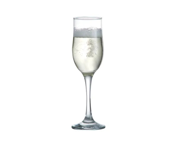 Single clear Tulip flute glass filled with sparkling white wine on a white background