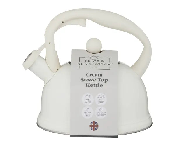 Cream stovetop kettle with curved handle and spout cover, labeled with product information tag.