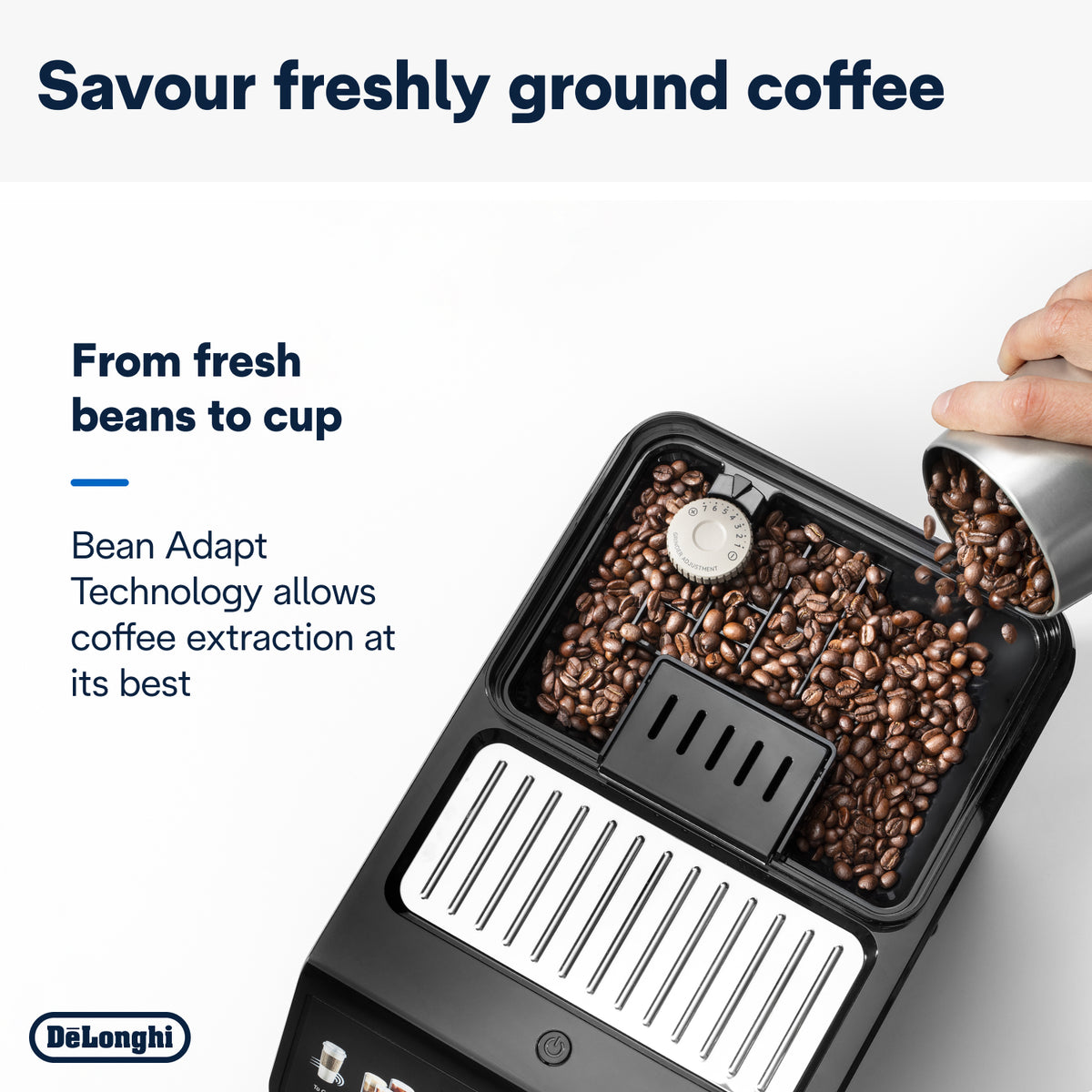 Top view of DeLonghi Eletta Explore coffee machine with fresh coffee beans being poured into the bean container.
