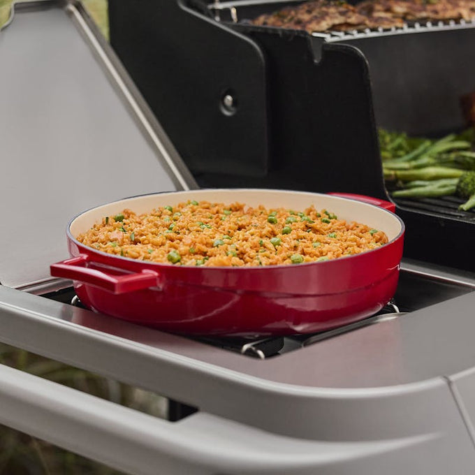 Weber Genesis E-435W Gas Barbecue with four burners, side burner, and stainless steel design - available at Keans Claremorris