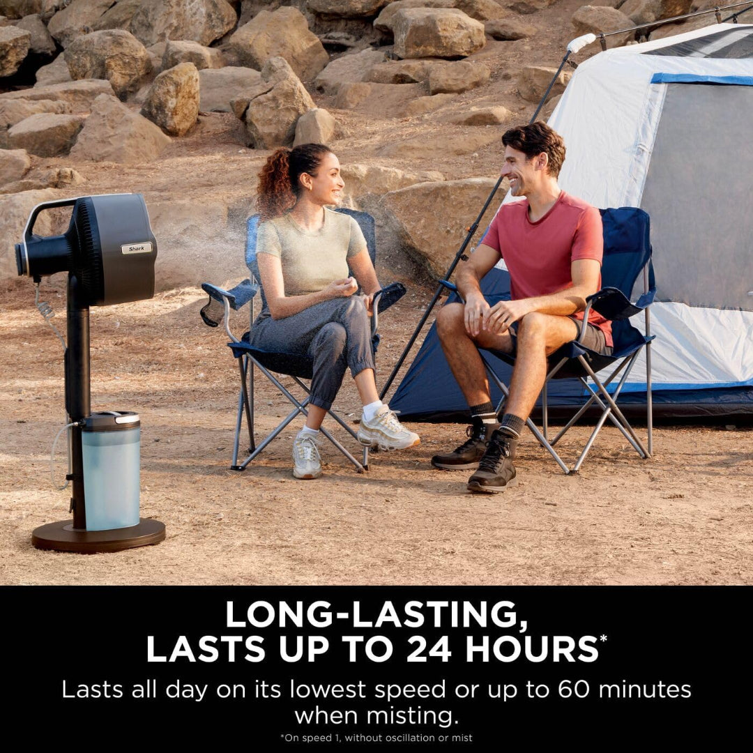Shark FlexBreeze Pro Mist fan misting two people sitting on camping chairs near a tent outdoors