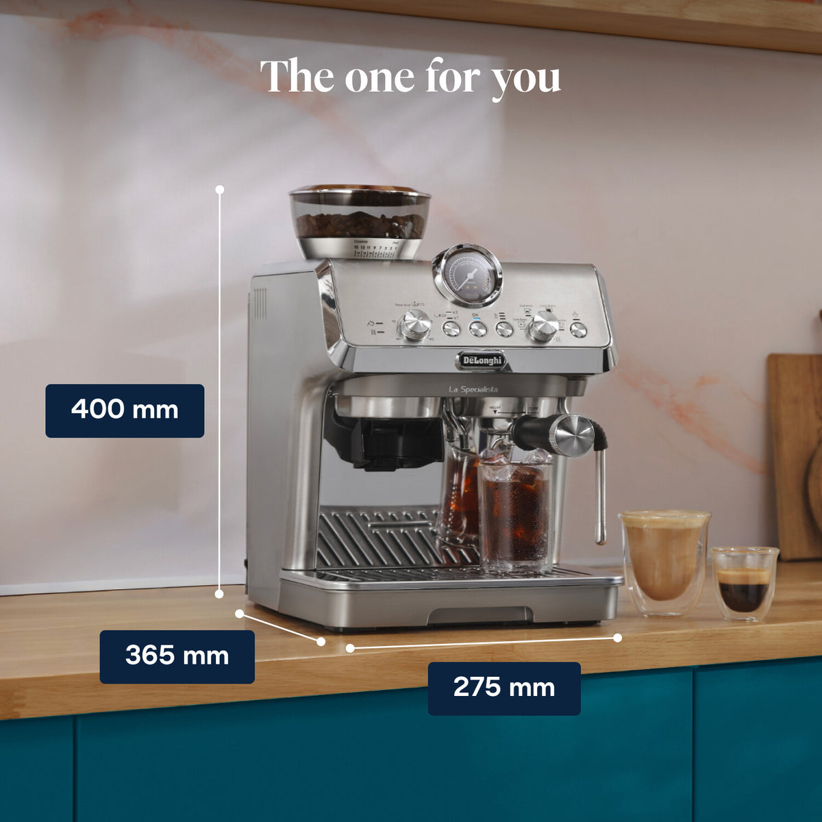 DeLonghi La Specialista Arte Evo espresso machine with built-in grinder and three coffee drinks on a wooden counter.