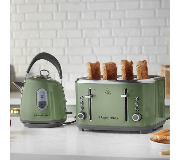 Russel Hobbs Stylevia sage green kettle and four-slice toaster with toast popping up on a white kitchen counter