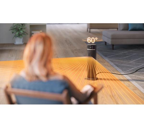 Philips Smart Tower Heater 5000 Series in dark grey on floor, showing 60° oscillation heating a room.