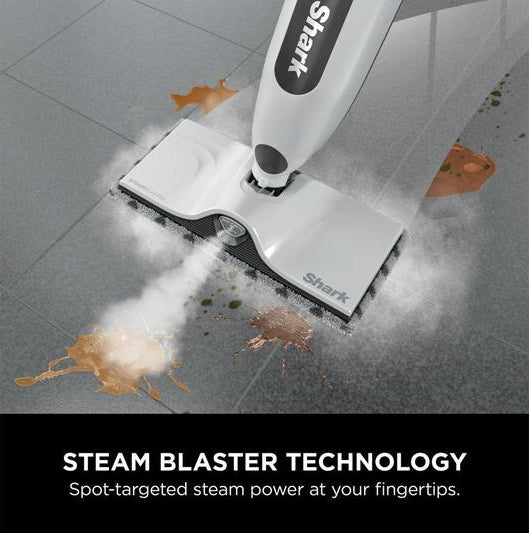 Shark SteamSpot S2001UK steam mop cleaning spills on tiled floor with steam blaster technology in action