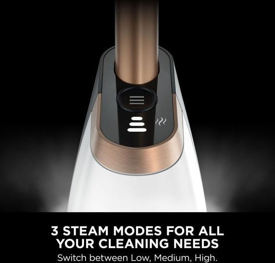 Close-up of Shark SteamSpot S2001UK steam cleaner control panel showing three steam mode buttons.