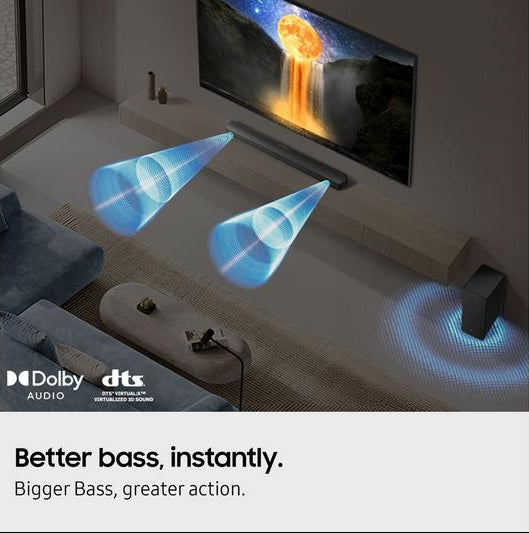 Samsung HW-B450F/XU 2.1 wireless soundbar and subwoofer in a living room with sound waves illustrating audio projection.