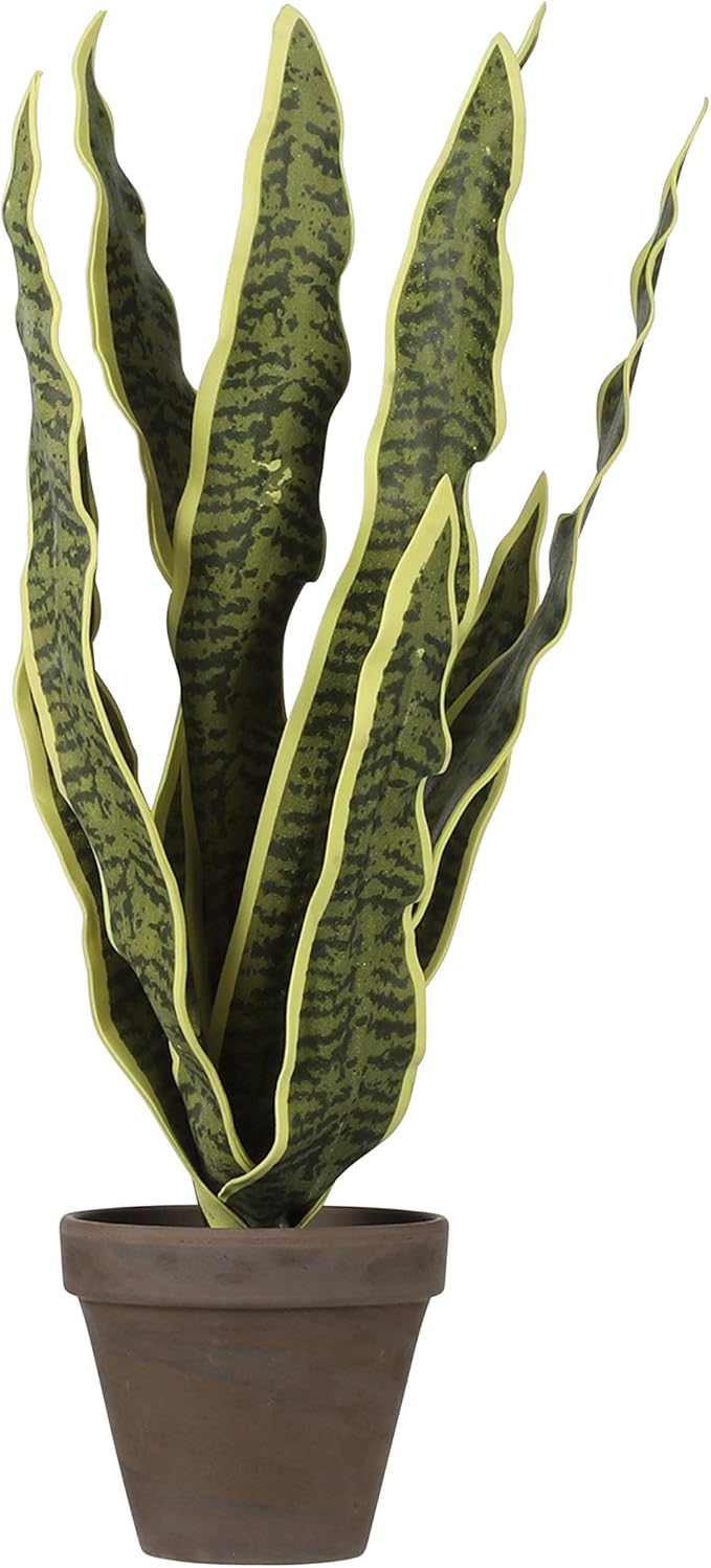 Artificial Sanseveria plant with tall green leaves edged in yellow in a grey terracotta pot.