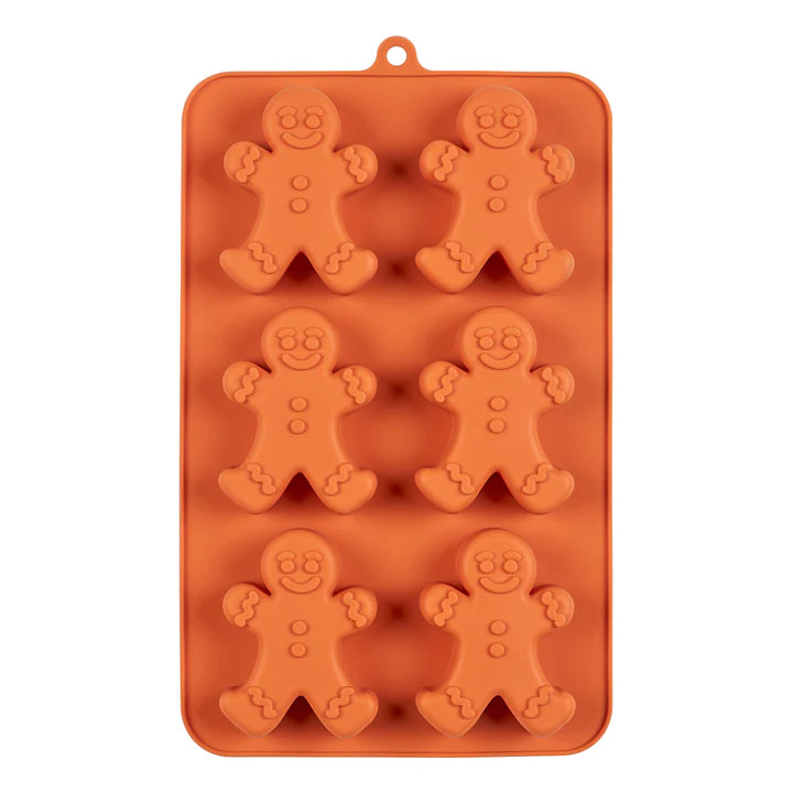 Orange silicone baking mould with six gingerbread man shapes for cakes or treats.