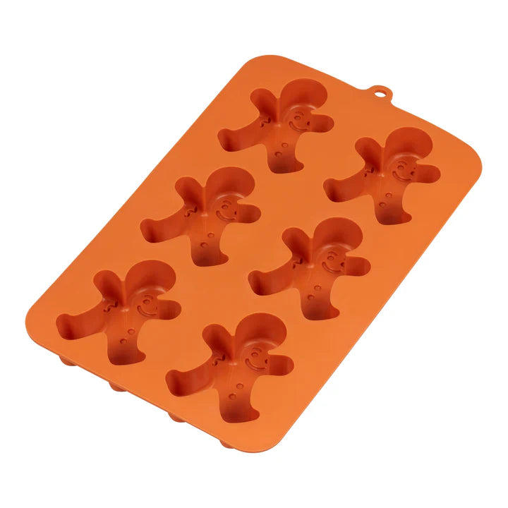 Orange silicone Tala gingerbread cake mould with six smiling gingerbread man cavities
