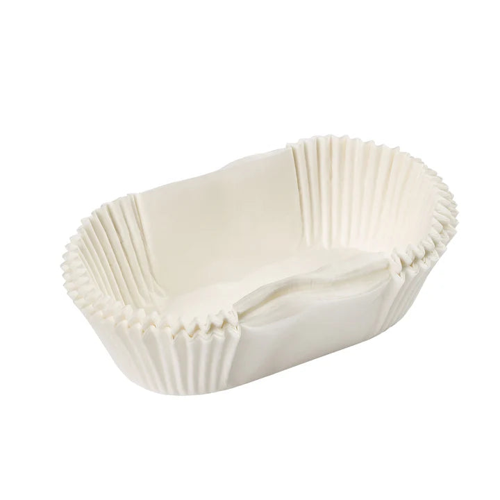 Stack of white Tala 1lb siliconised loaf liners with a rectangular shape and pleated sides.