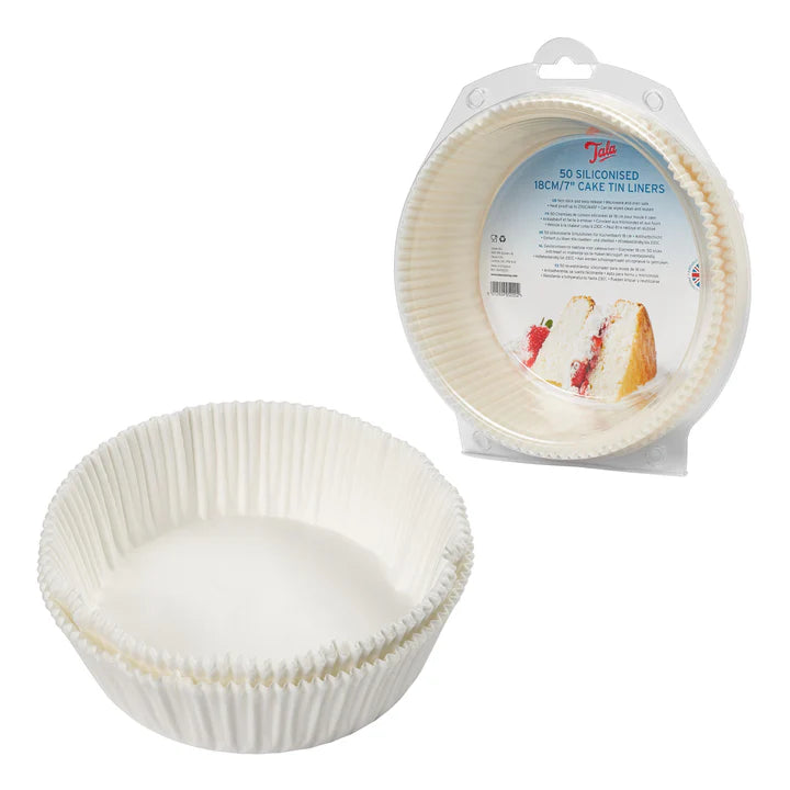 Tala 50 siliconised 18cm cake tin liners stacked with packaging showing product label and cake image.