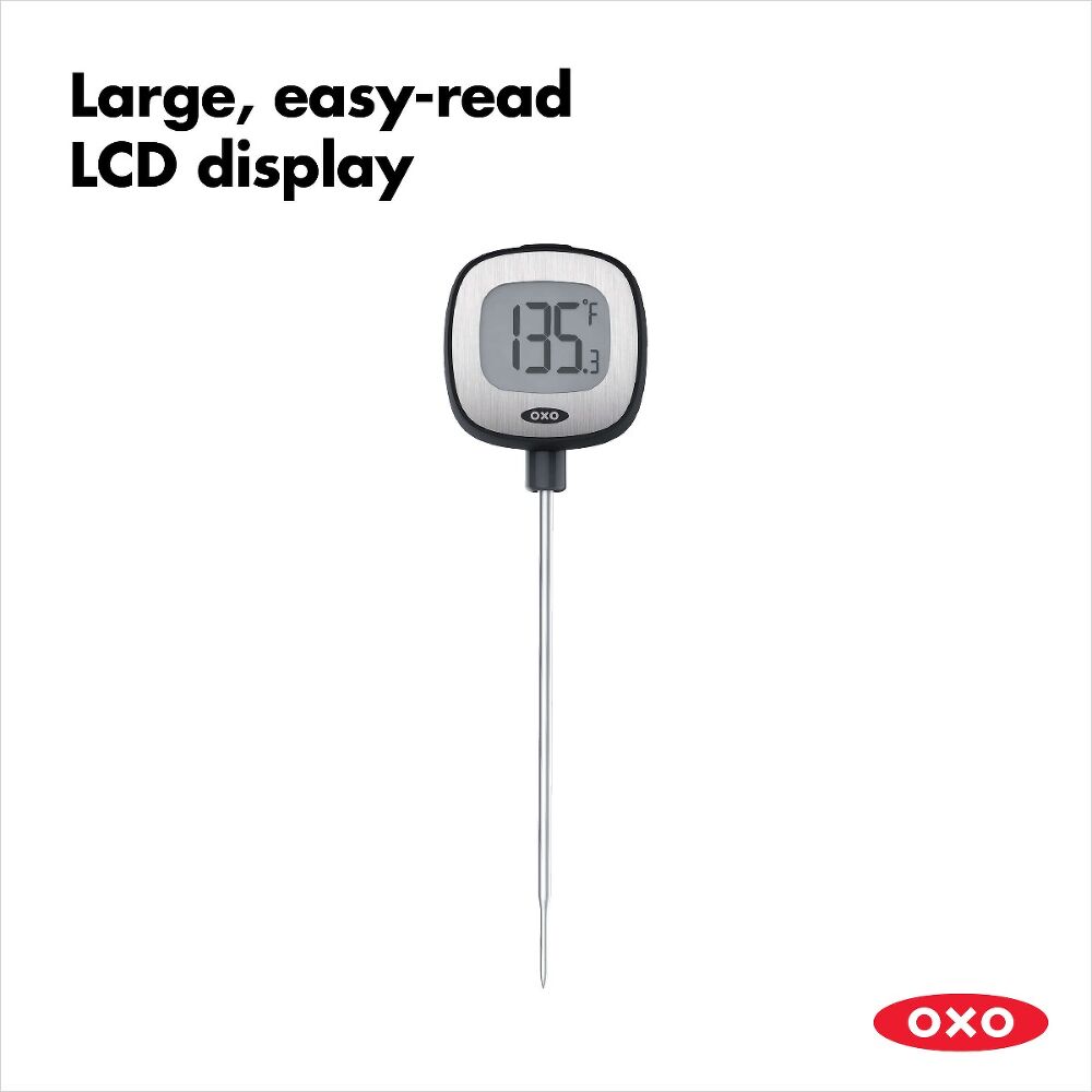 Oxo thermometer with large LCD display showing 135.3°F and stainless steel probe.