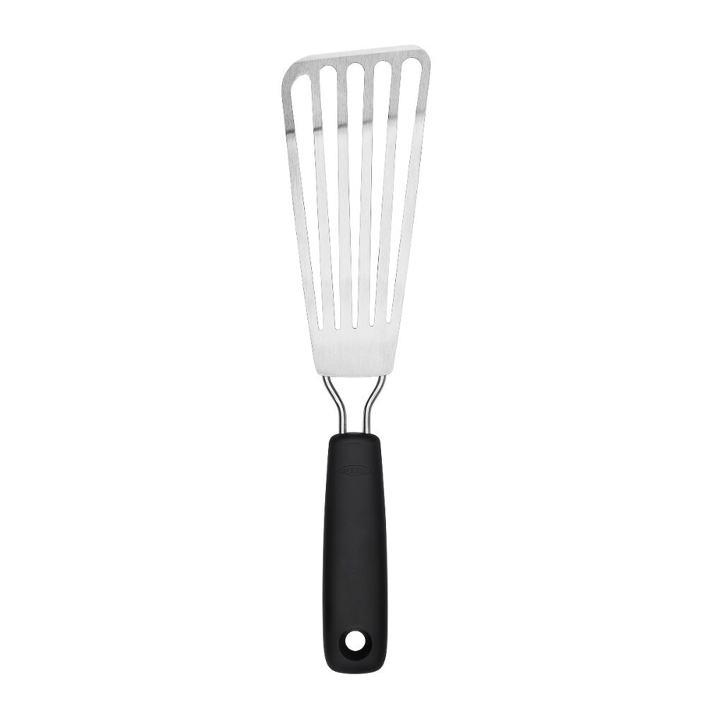 Oxo Little Fish Turner with slotted stainless steel head and black non-slip handle on white background