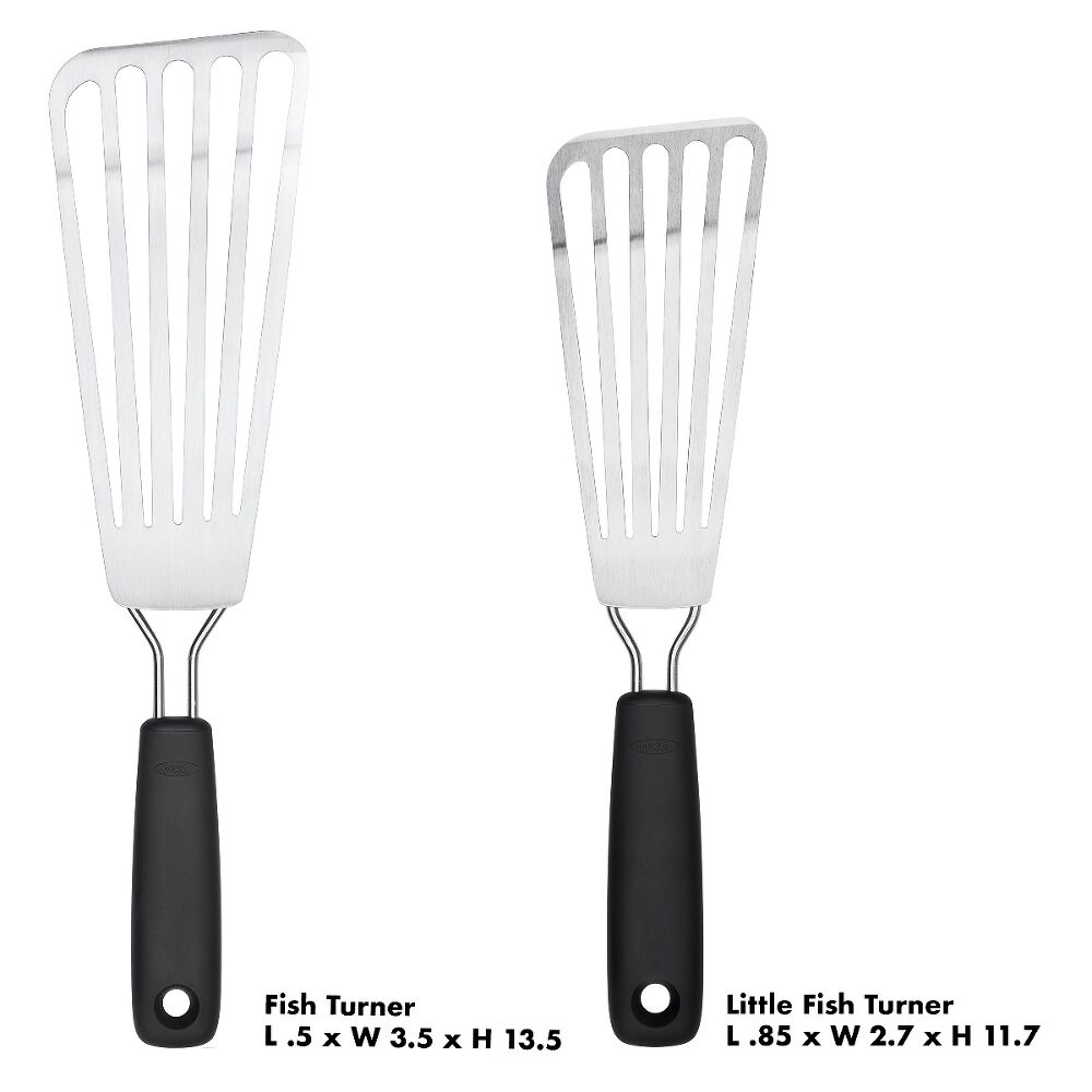 Oxo Little Fish Turner with black handle and slotted stainless steel head, shown next to larger fish turner.