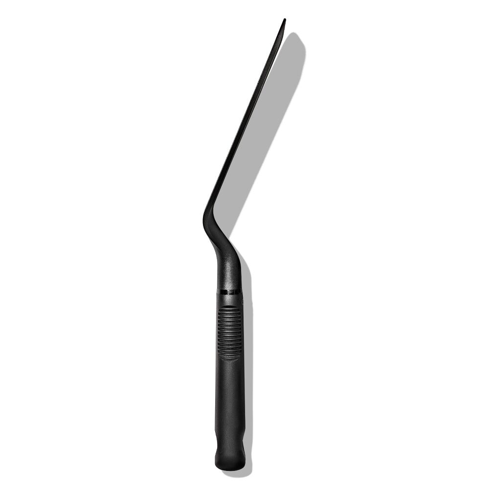 Black Oxo nylon lasagne turner with angled flat blade and textured handle on white background