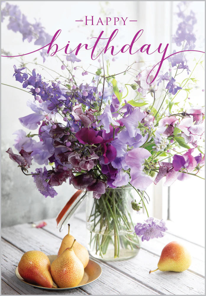 Happy Birthday card with purple and pink sweet pea flowers in a glass jar and pears on a wooden table.