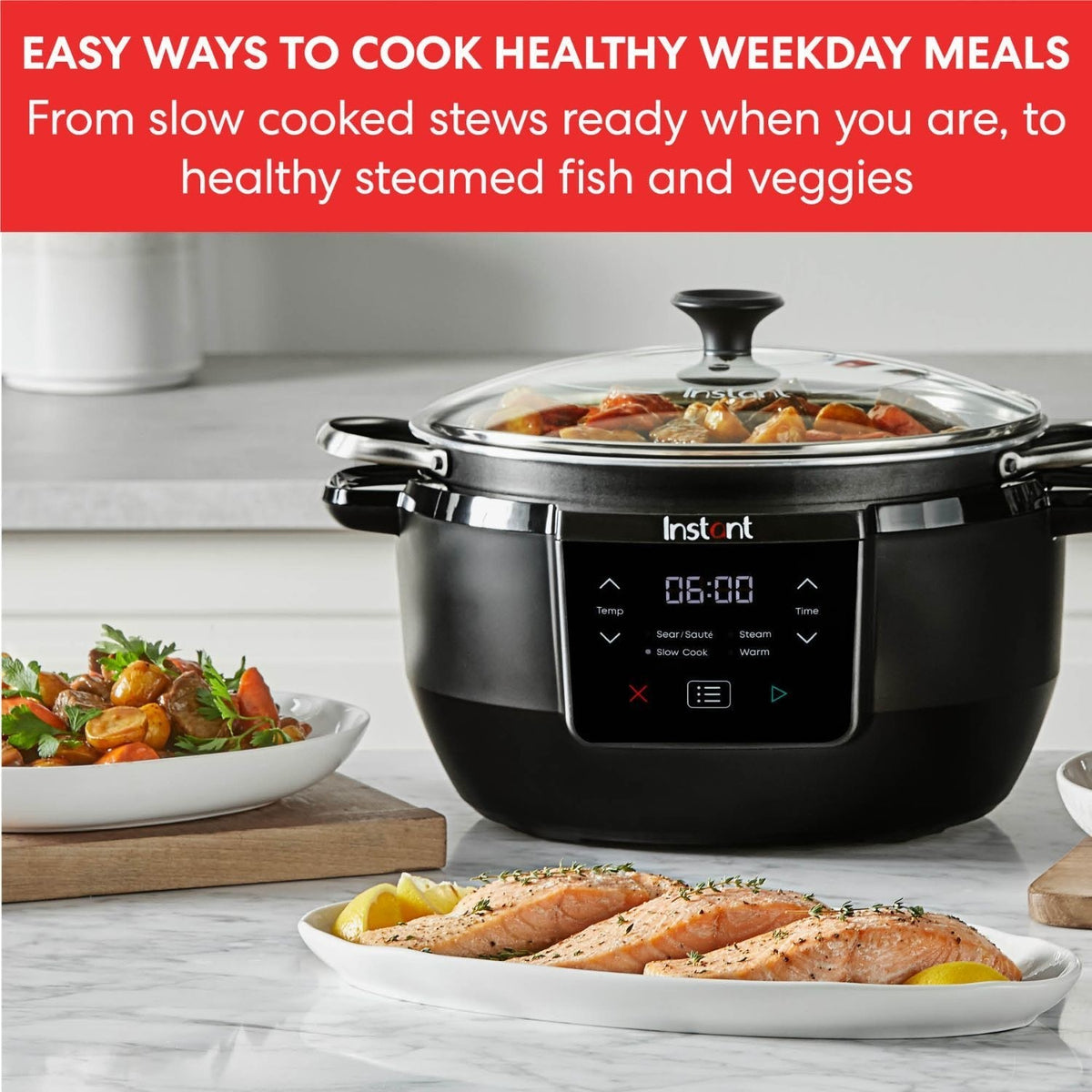 Instant Pot Superior Slow Cooker with glass lid cooking stew, salmon and vegetables on kitchen counter.