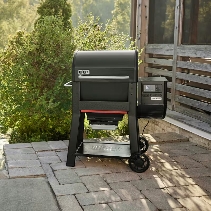 Weber Searwood Pellet Barbecue on patio showing front and side with digital control panel and wheels
