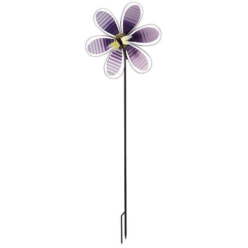 Purple and white petal Spinning Blooms wind spinner with a yellow and black bee on a black stake