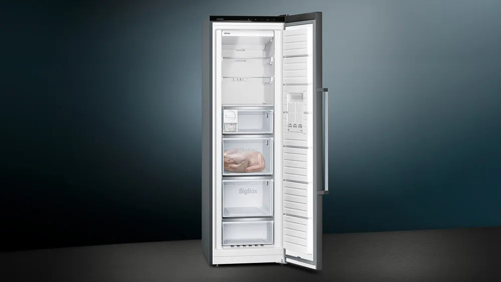 Siemens IQ500 black inox freezer with door open, showing multiple transparent storage drawers and shelves inside.