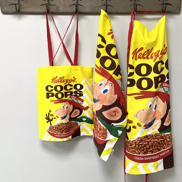 Vintage Kelloggs Coco Pops adult apron with retro design, perfect for cooking; available at Keans Claremorris store.