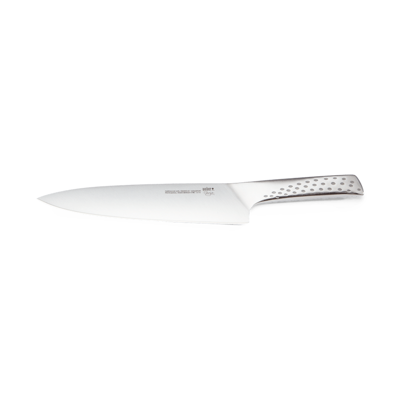 Weber Deluxe Chef’s Knife with a long stainless steel blade and a perforated metal handle on white background