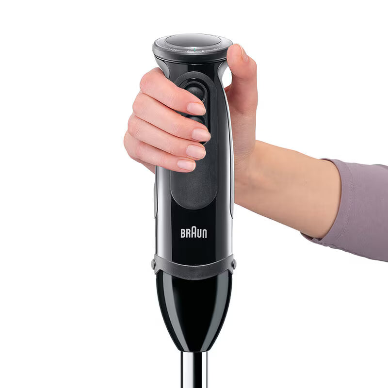 Hand holding Braun Hand Blender MultiQuick 5 MQ5237BK in black with stainless steel blending shaft