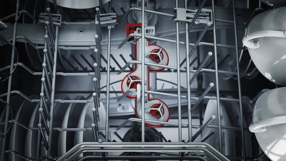 Interior view of Bosch Series 6 dishwasher rack with red spray arms and white dishes on the right side