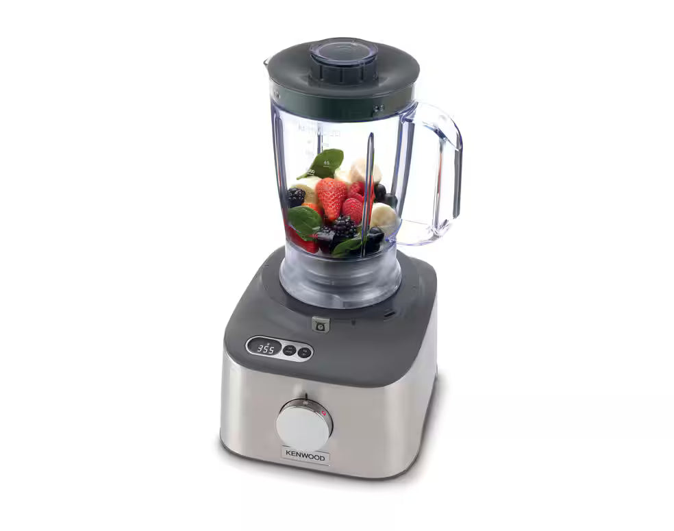 Kenwood MultiPro Compact food processor with clear blender jug filled with mixed berries and spinach leaves