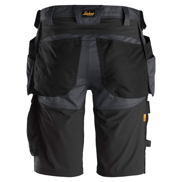 Snickers Stretch Shorts in black and grey, shown from the back with multiple pockets and tool loops.