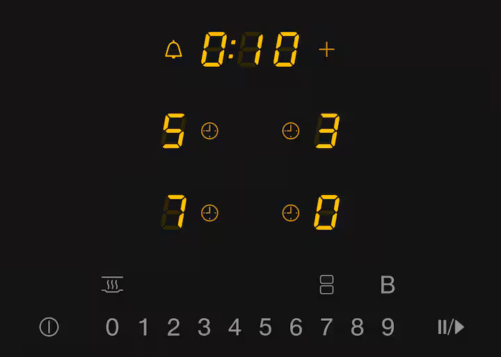 Close-up of Miele KM 7363 FL induction hob digital control panel with timer and power settings displayed.