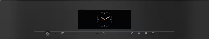 Close-up of the Miele DGC 7865 HCX Pro ArtLine steam oven control panel with digital clock display.