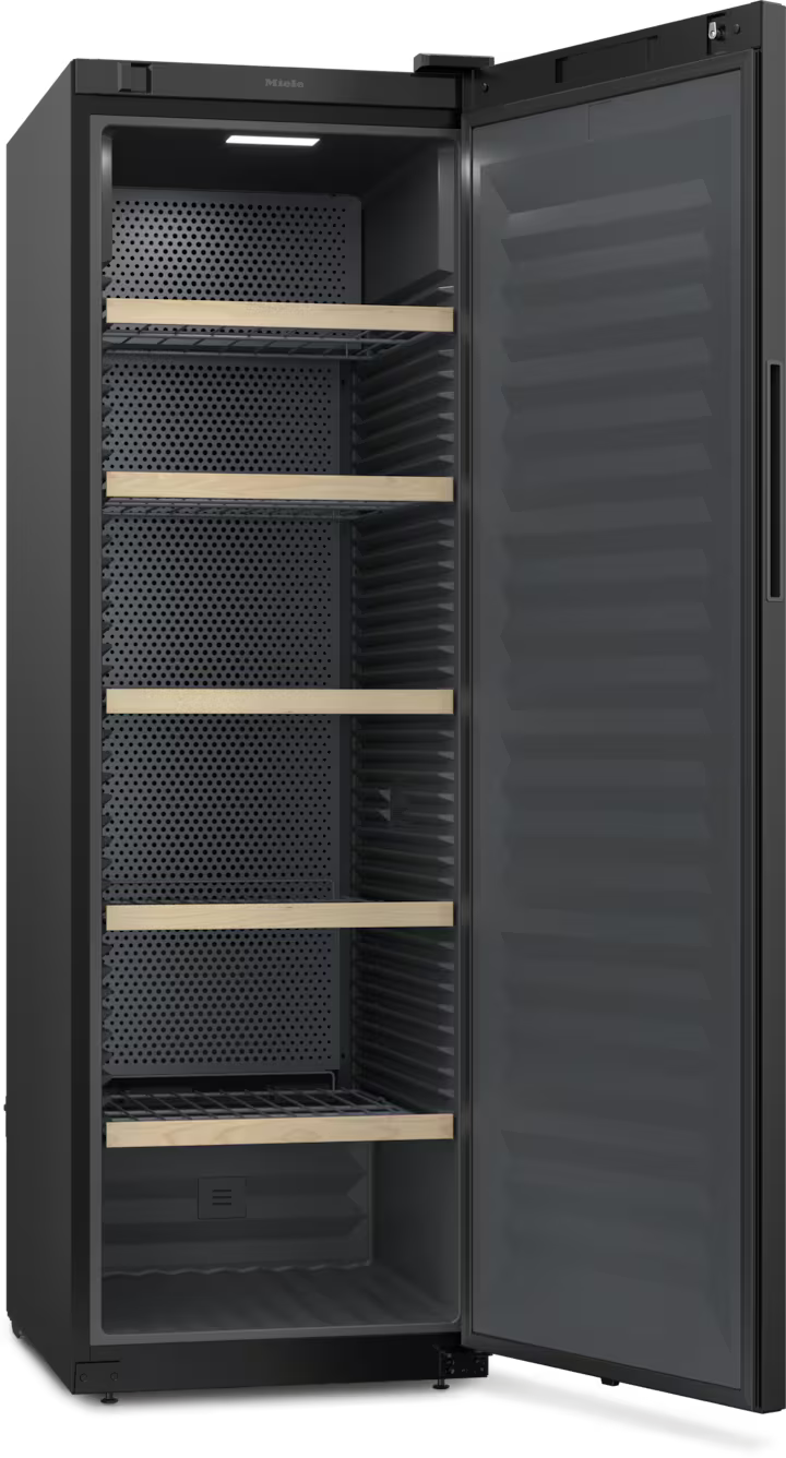 Miele KWT 4584 E built-in wine cooler with open door, black interior, and four wooden shelves visible