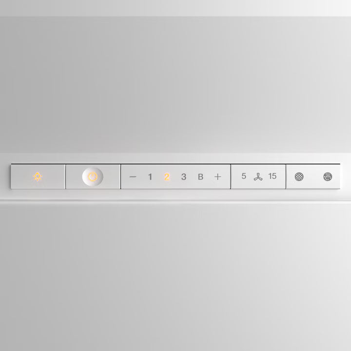 Close-up of Miele DAC 4940 ceiling extractor hood control panel with illuminated power and speed settings.