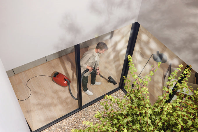 Miele Guard M1 Terra Red cylinder vacuum cleaner, powerful suction, compact design – available at Keans Claremorris.