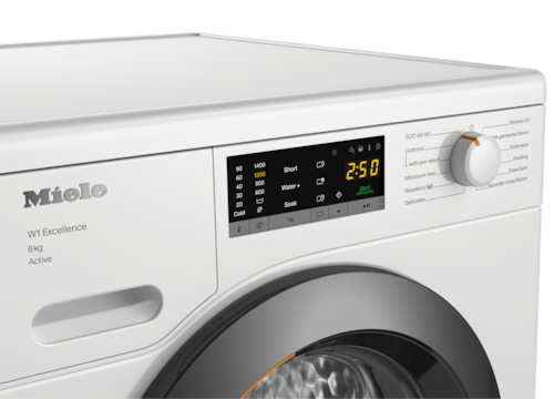 Miele 8kg front-loading washing machine with digital display and control dial, white finish, angled view.