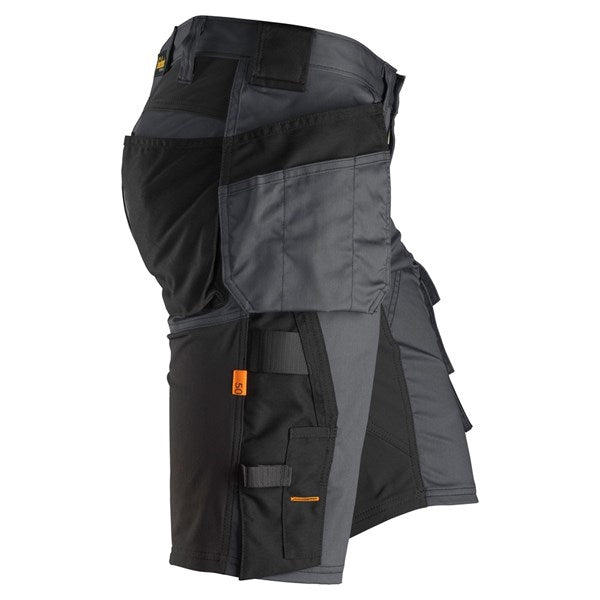 Snickers Stretch Shorts in black and grey, side view showing multiple pockets and reinforced fabric panels.