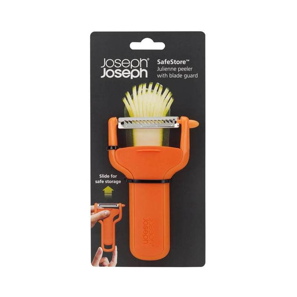 Joseph Joseph SafeStore orange julienne peeler with sharp stainless steel blade, integrated blade guard, and potato-eye