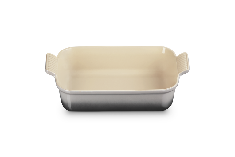 Le Creuset Stoneware Heritage rectangular dish 26cm in flint, shown empty from the front angle.