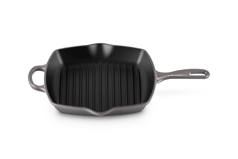 Le Creuset 26cm Square Grillit Flint with ridged cooking surface and long handle, top view.