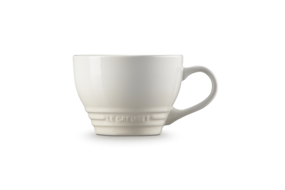 Le Creuset Grand Mug 400ml in meringue color, side view showing handle and embossed logo.