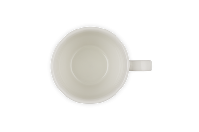 Le Creuset Grand Mug 400ml in meringue color shown from top view with handle on the right side.