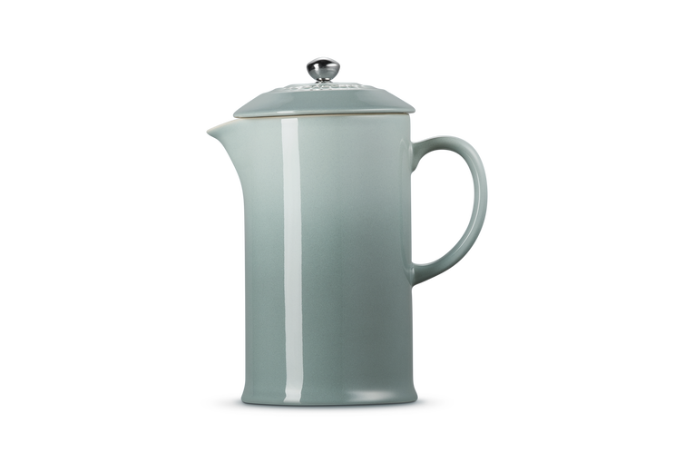 Le Creuset 1L Cafetiere in sea salt color with metal press and rounded handle on white background