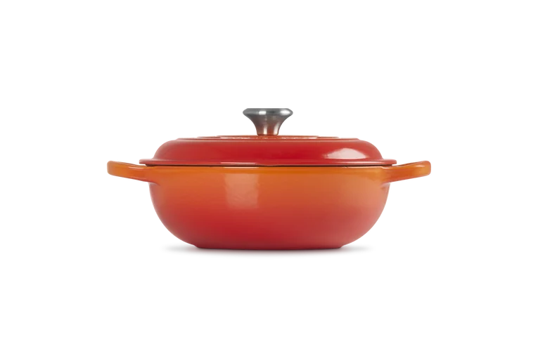 Signature Round Stew Pot 22cm in volcanic orange with lid and metal knob, side view on white background