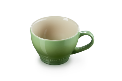 Le Creuset Grand Mug 400ml in bamboo green with a glossy finish and cream interior, shown front angle.