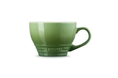 Le Creuset Grand Mug 400ml in bamboo green with a rounded handle and embossed logo on the base.