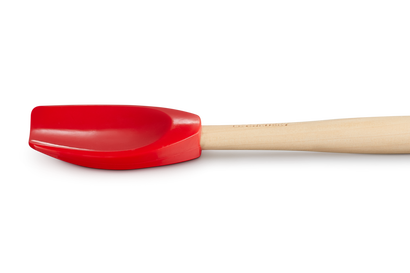 Le Creuset Cerise red spatula spoon, durable silicone, ideal for cooking and baking – available at Keans Claremorris.